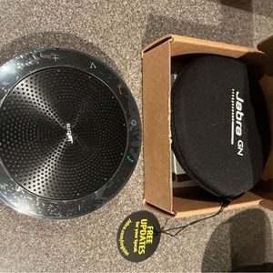 Jabra Bluetooth speaker puck.